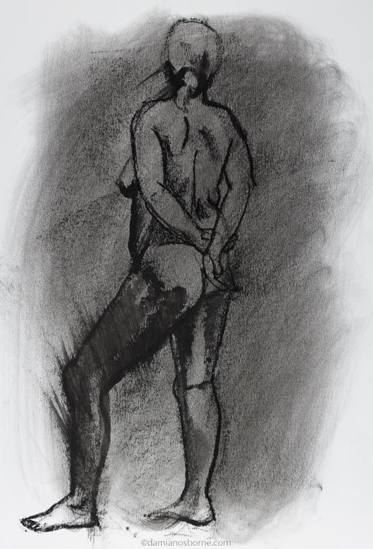 Life drawing pose in charcoal of a standing woman