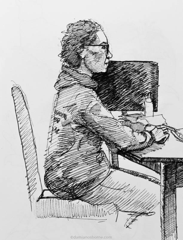 Sketchbook 2020, Pen sketch of Janine at desk working, Damian Osborne